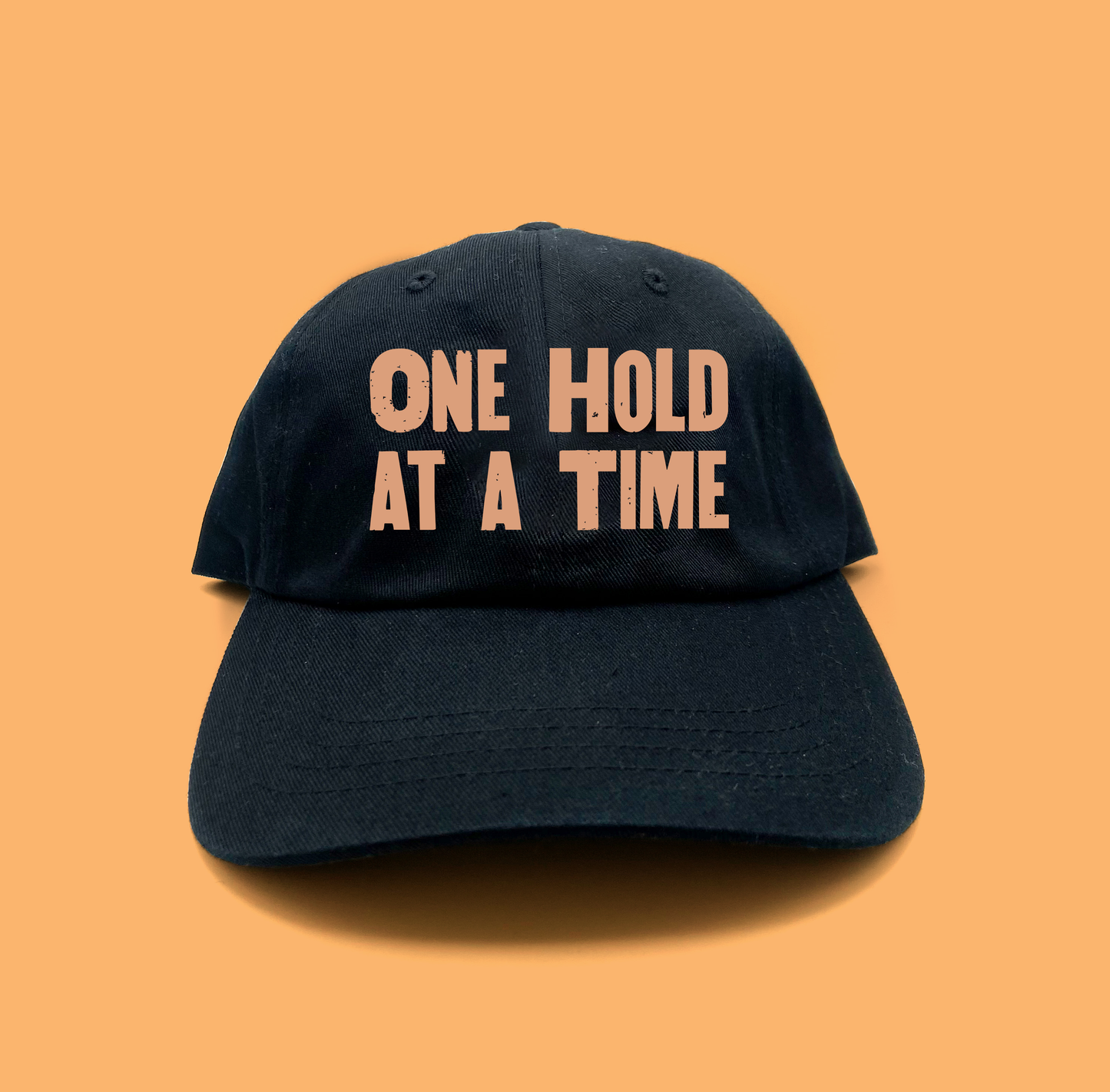 "One Hold at a Time" Light Peach Dad Hat