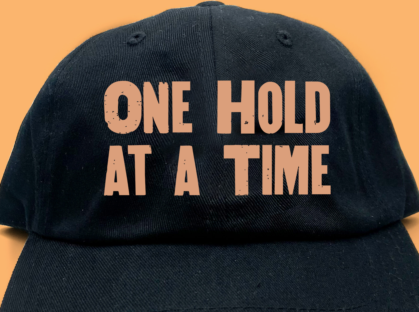 "One Hold at a Time" Light Peach Dad Hat