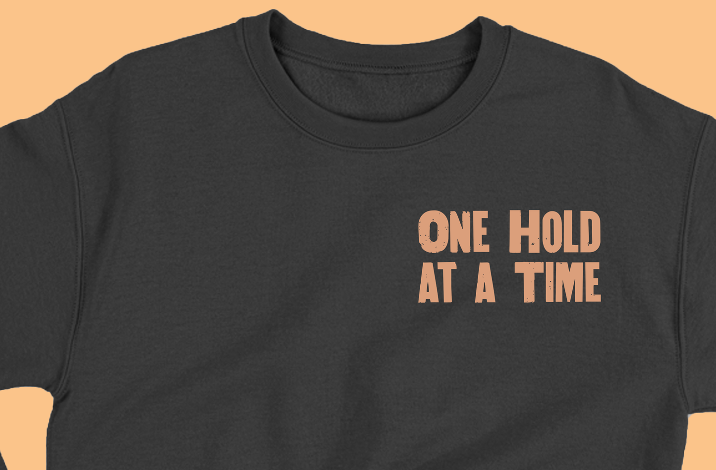 "One Hold at a Time" Light Peach Sweatshirt