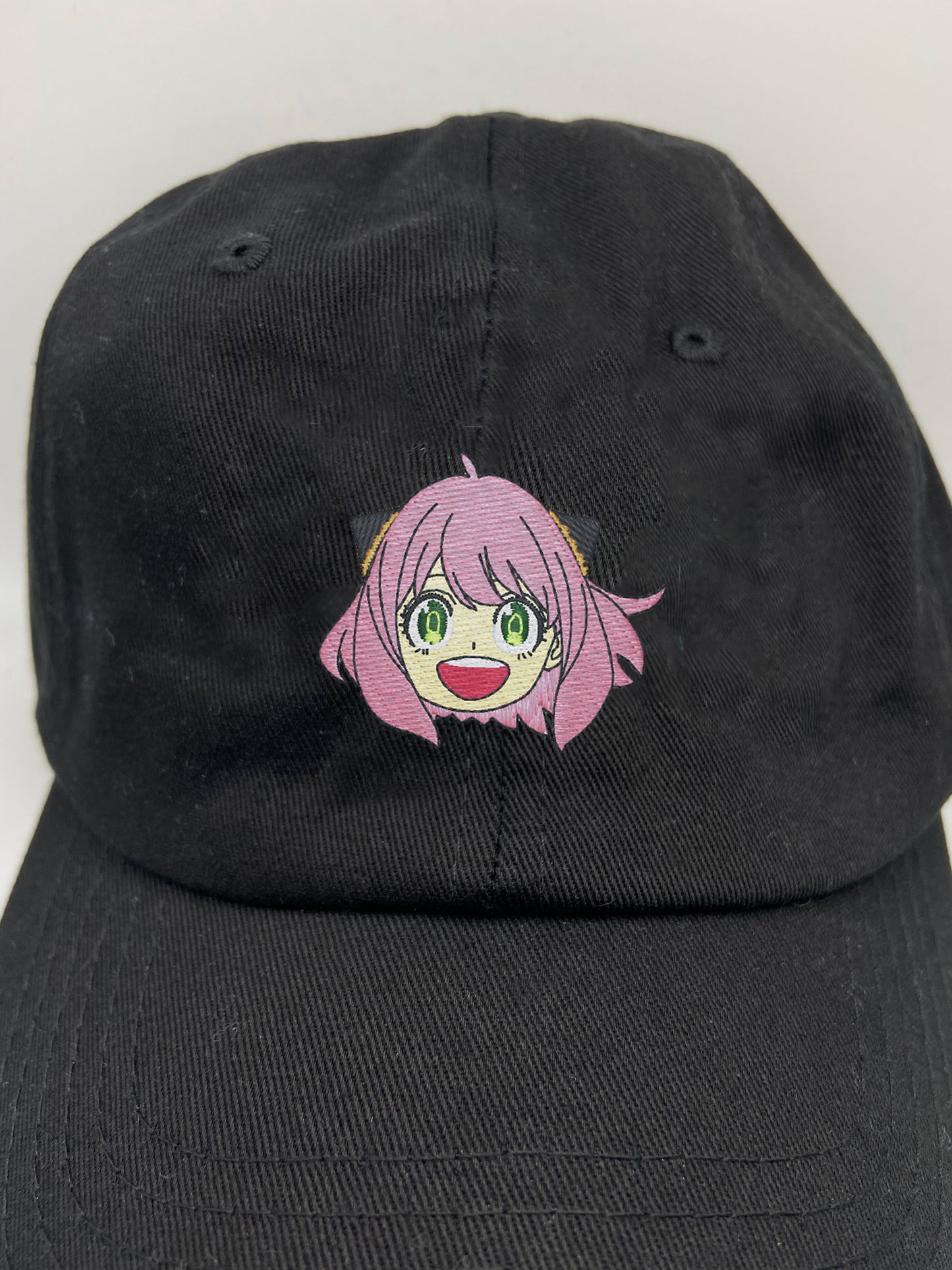 anya smile dad hat