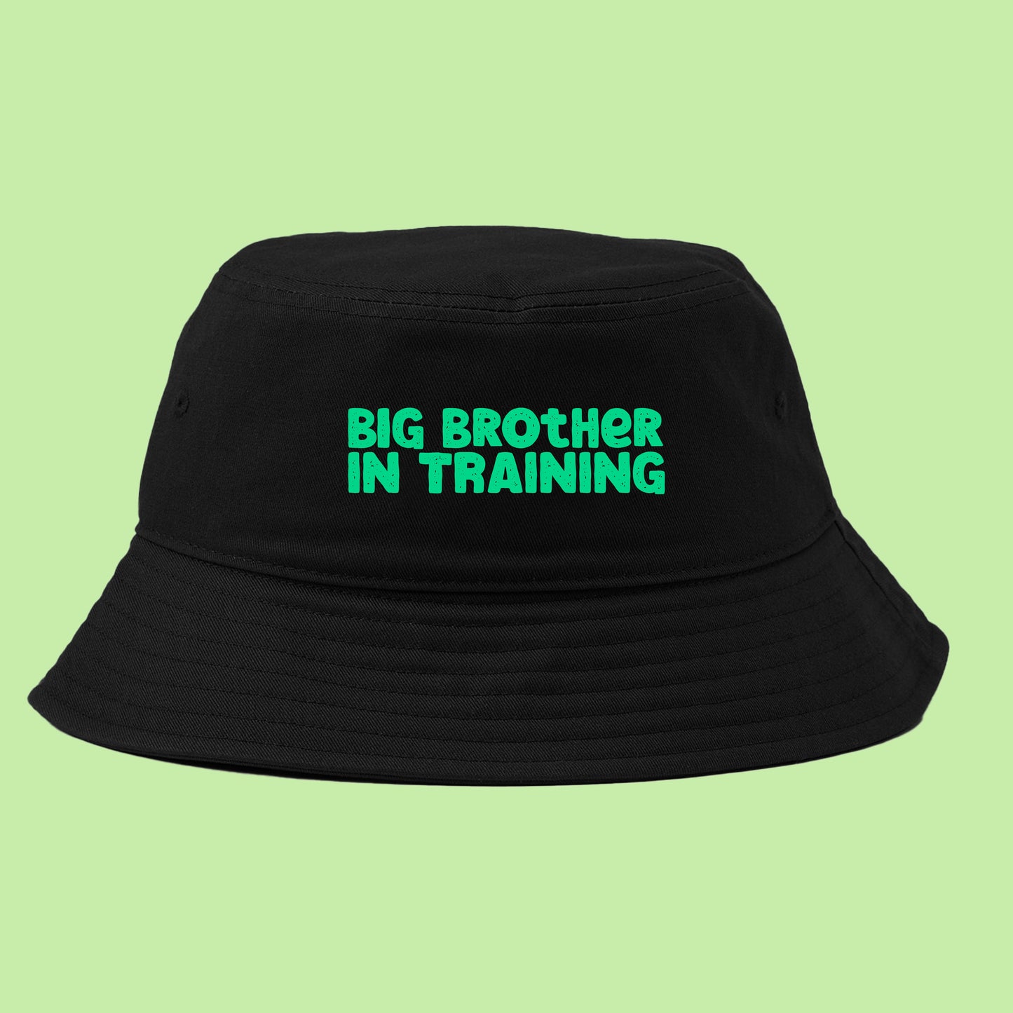 big brother in training green bucket hat