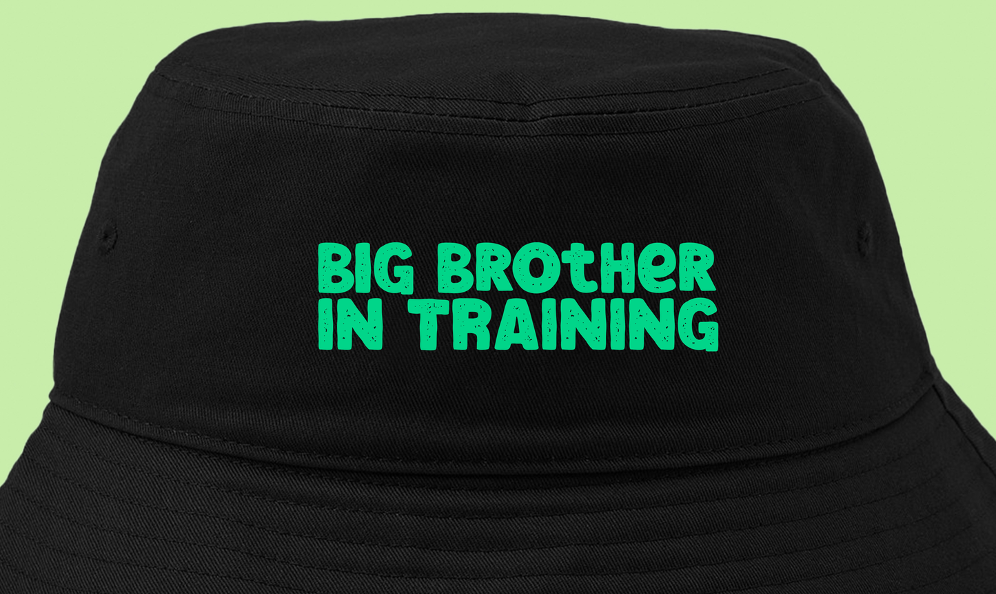 big brother in training green bucket hat