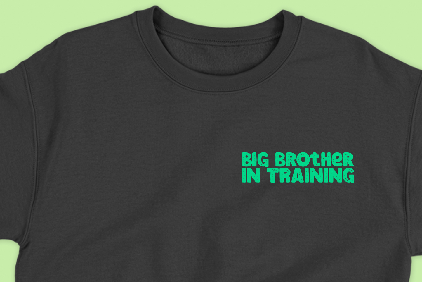 big brother in training green sweatshirt