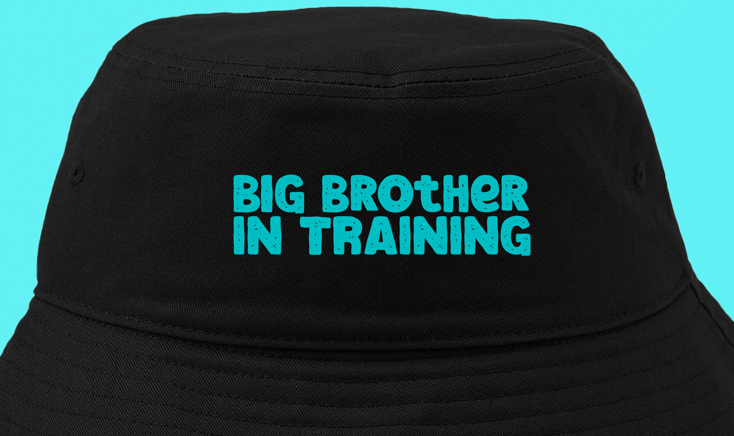 big brother in training light blue green bucket hat