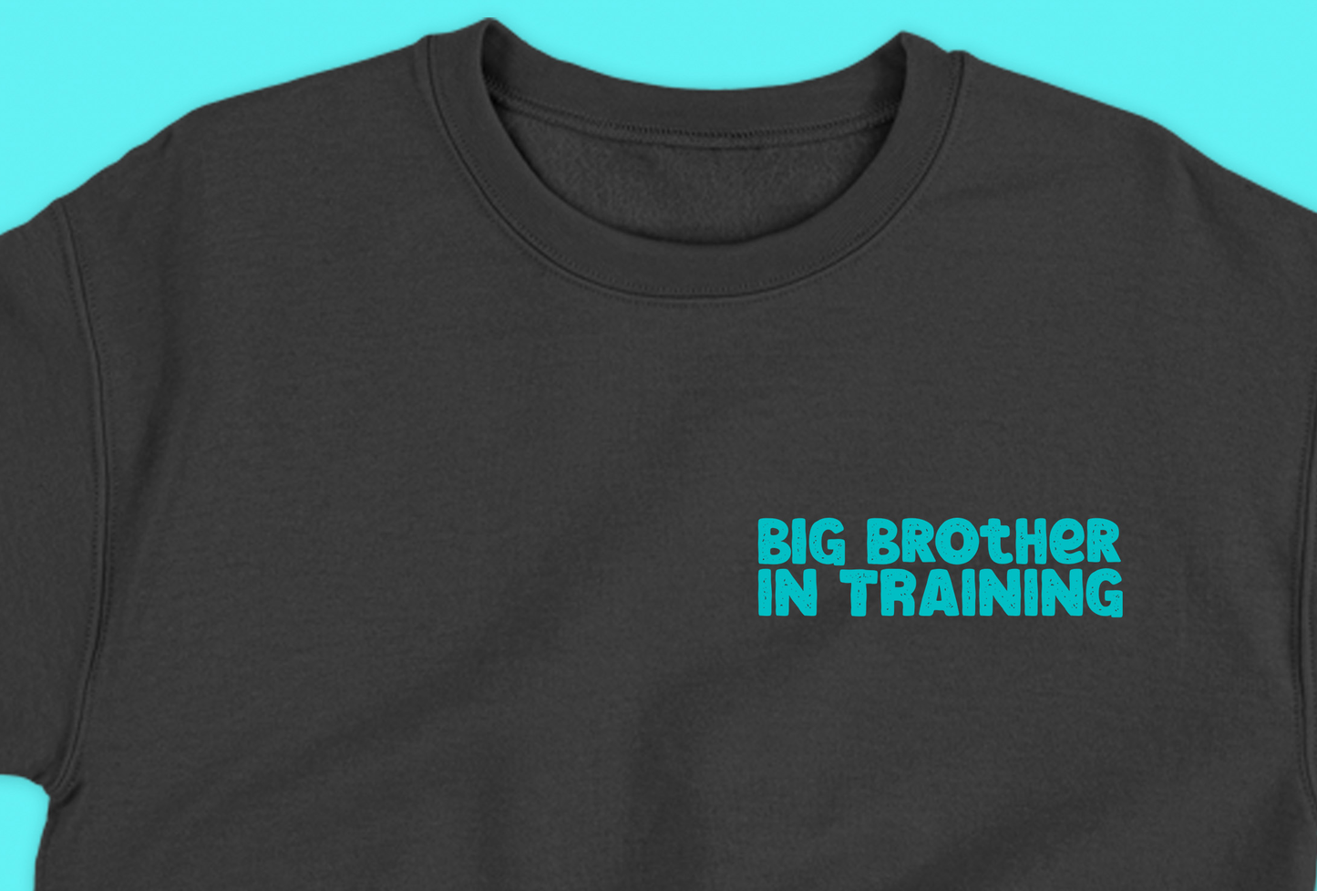 big brother in training light blue green sweatshirt