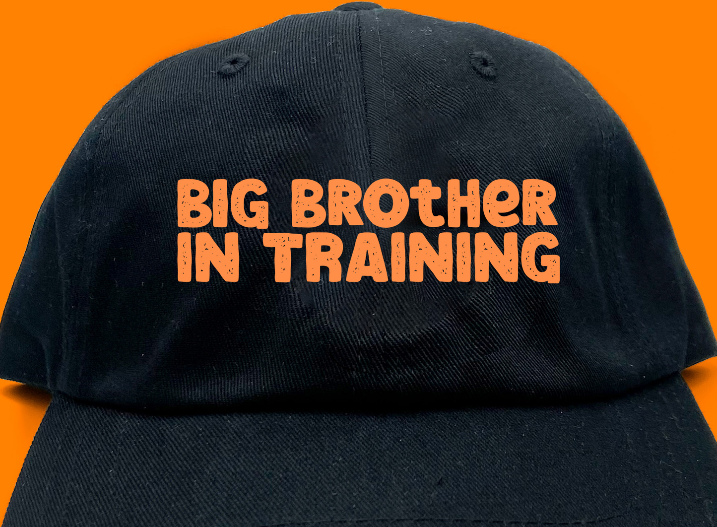 big brother in training orange dad hat