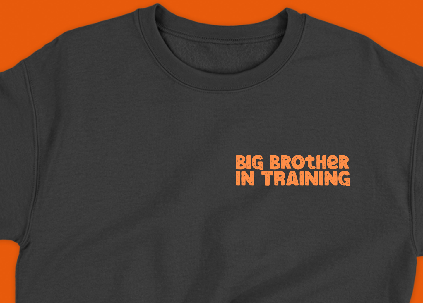 big brother in training orange sweatshirt