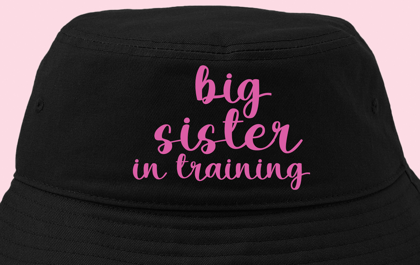 big sister in training dark pink bucket hat