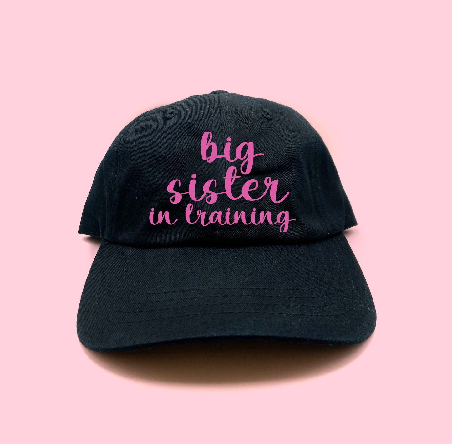 big sister in training dark pink dad hat