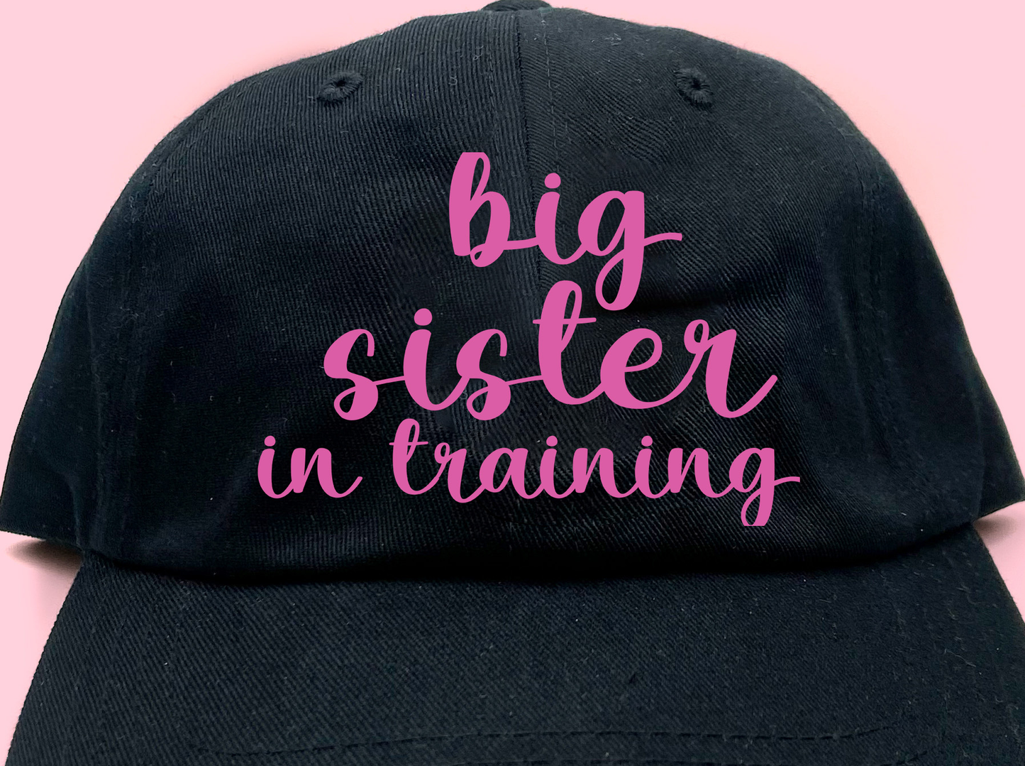 big sister in training dark pink dad hat