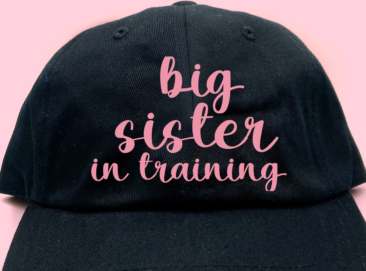 big sister in training pink dad hat