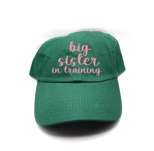 big sister in training pink dad hat