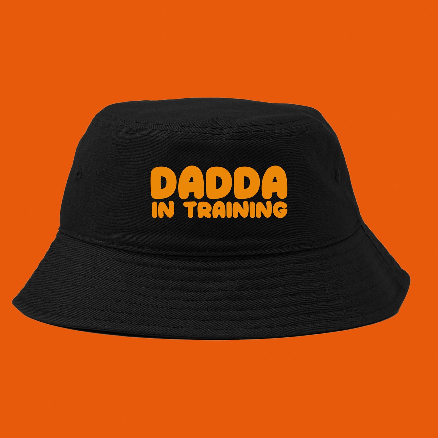 dadda in training yellow bukcet hat
