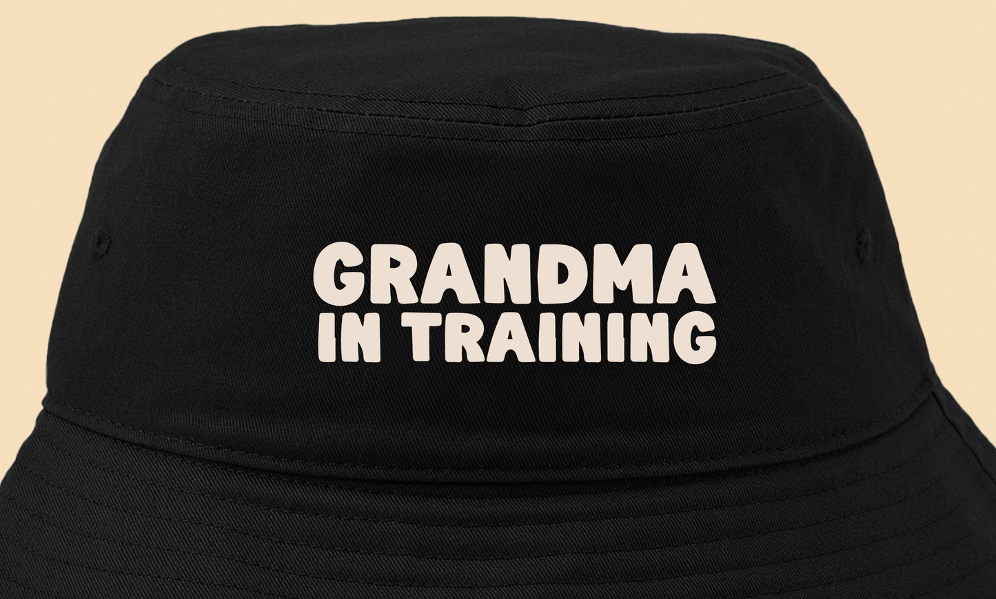 grandma in training cream bucket hat