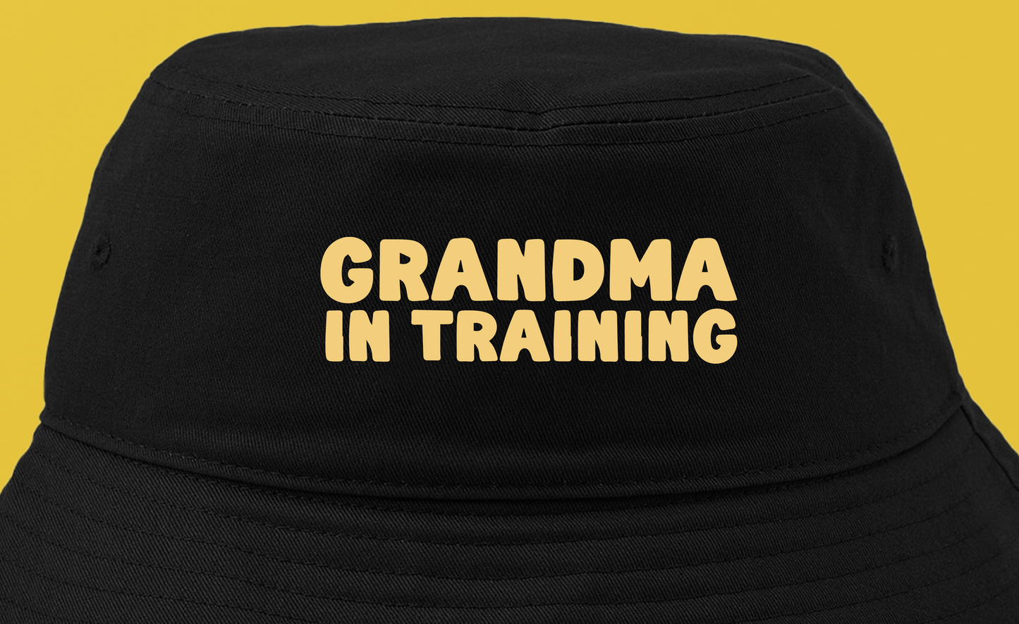 grandma in training light yellow bucket hat
