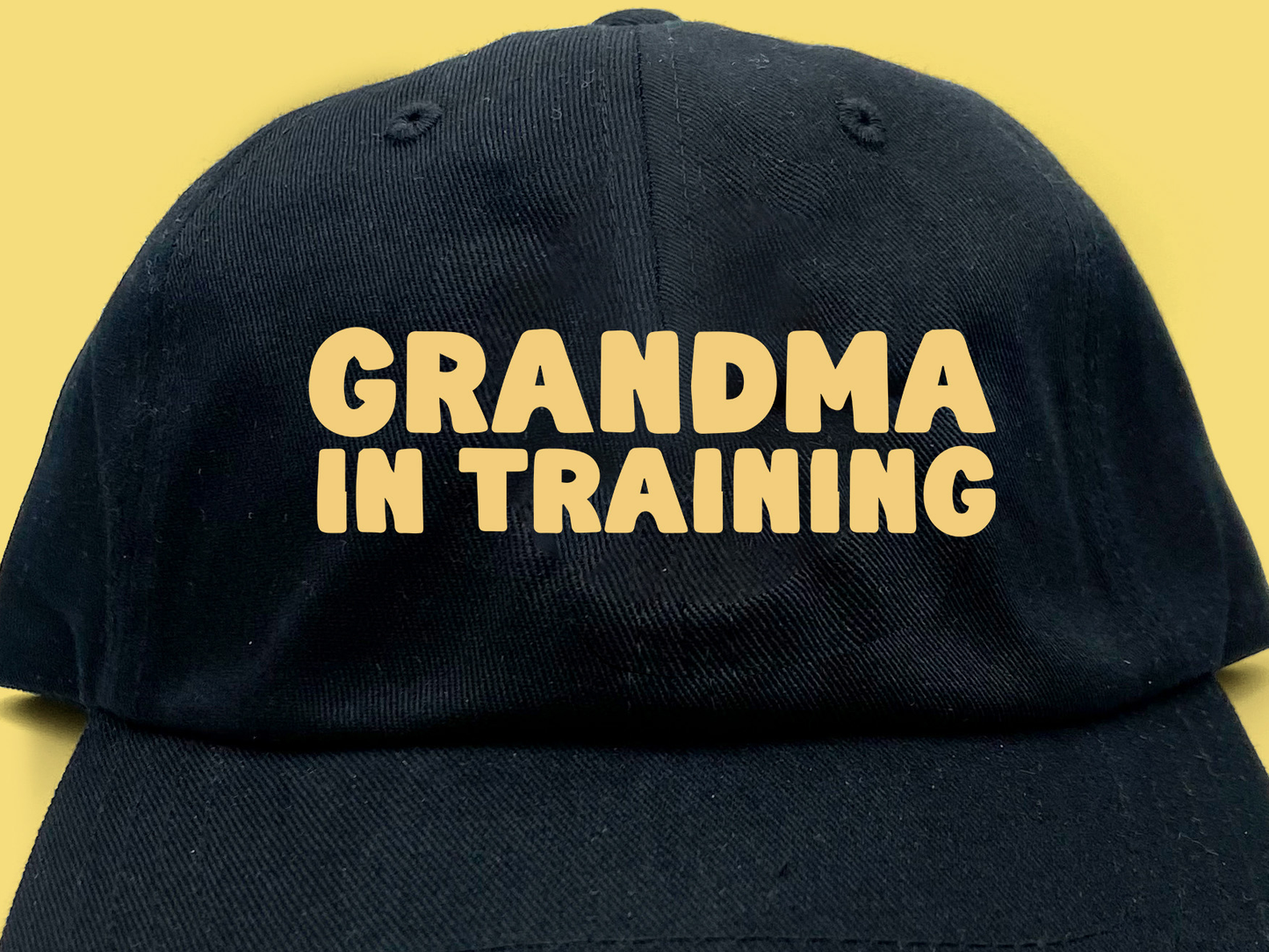 grandma in training cream dad hat