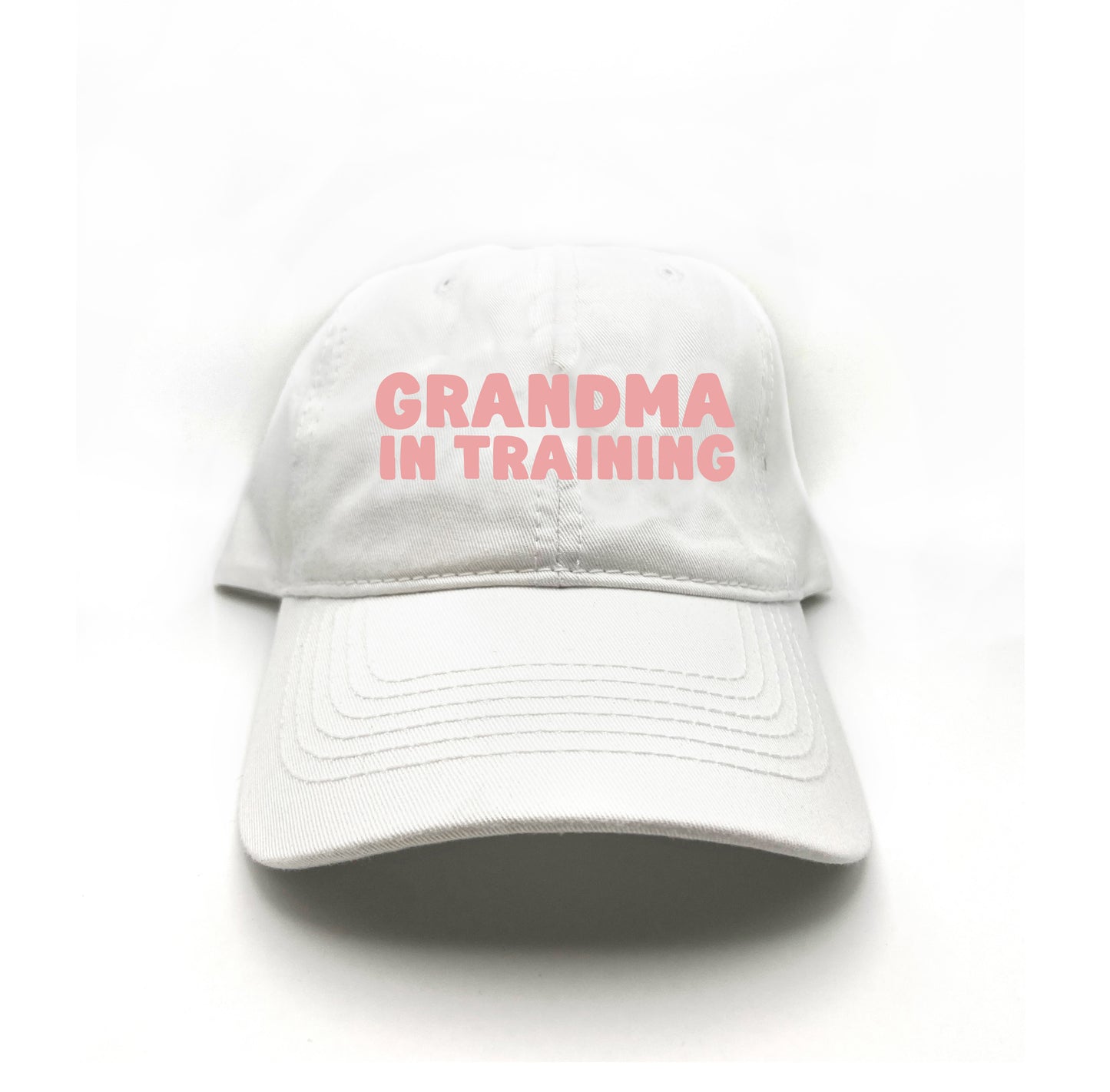 grandma in training pink dad hat