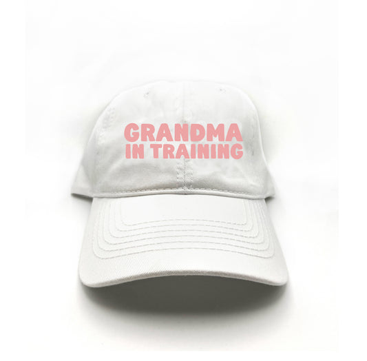 grandma in training pink dad hat
