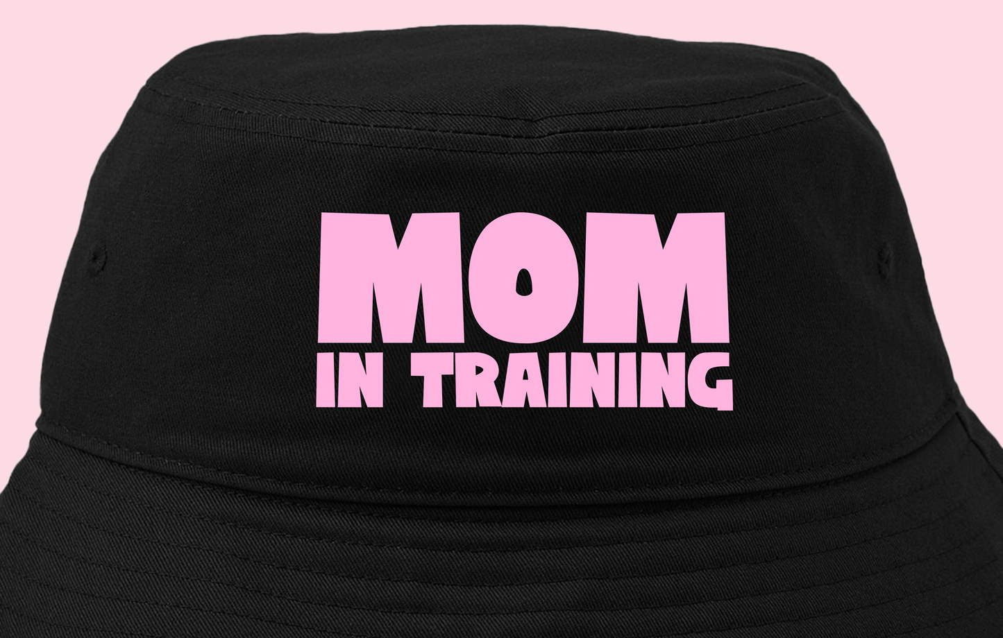 mom in training light pink bucket hat