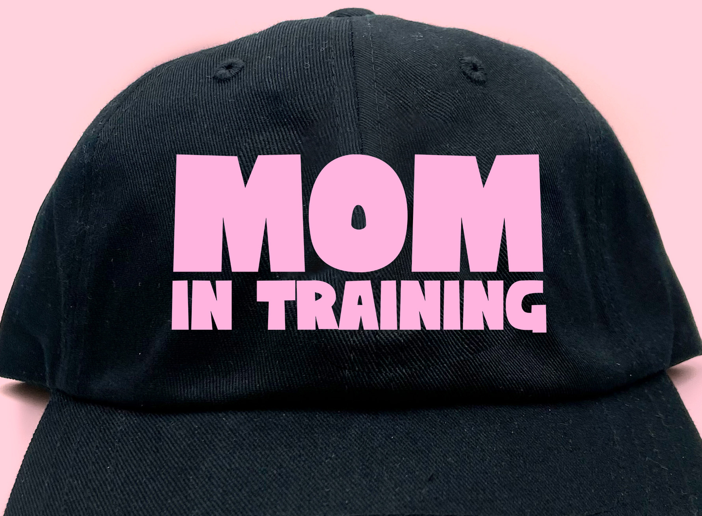mom in training light pink dad hat