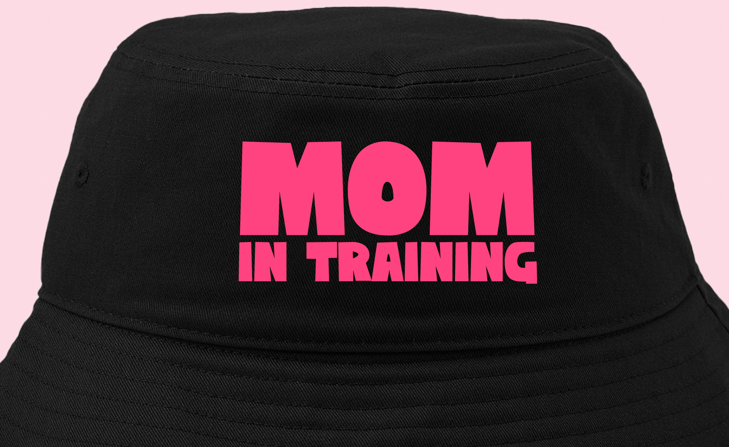 mom in training pink bucket hat