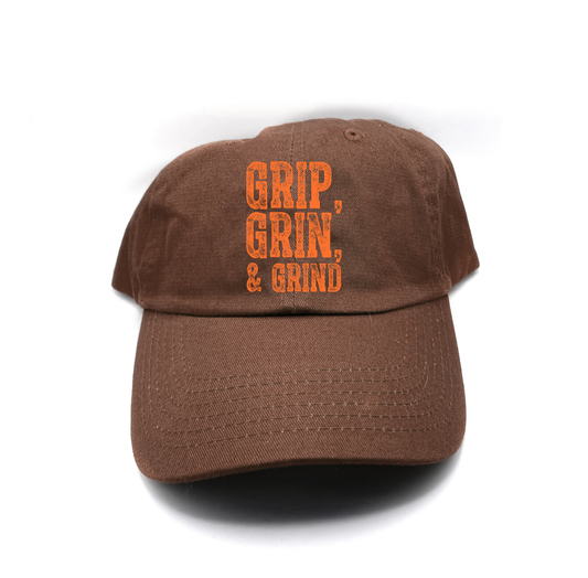 "Grip, Grin, & Grind" Orange Dad Hat